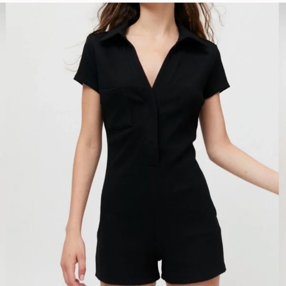 Worn once Black half button up black romper with collar size xs